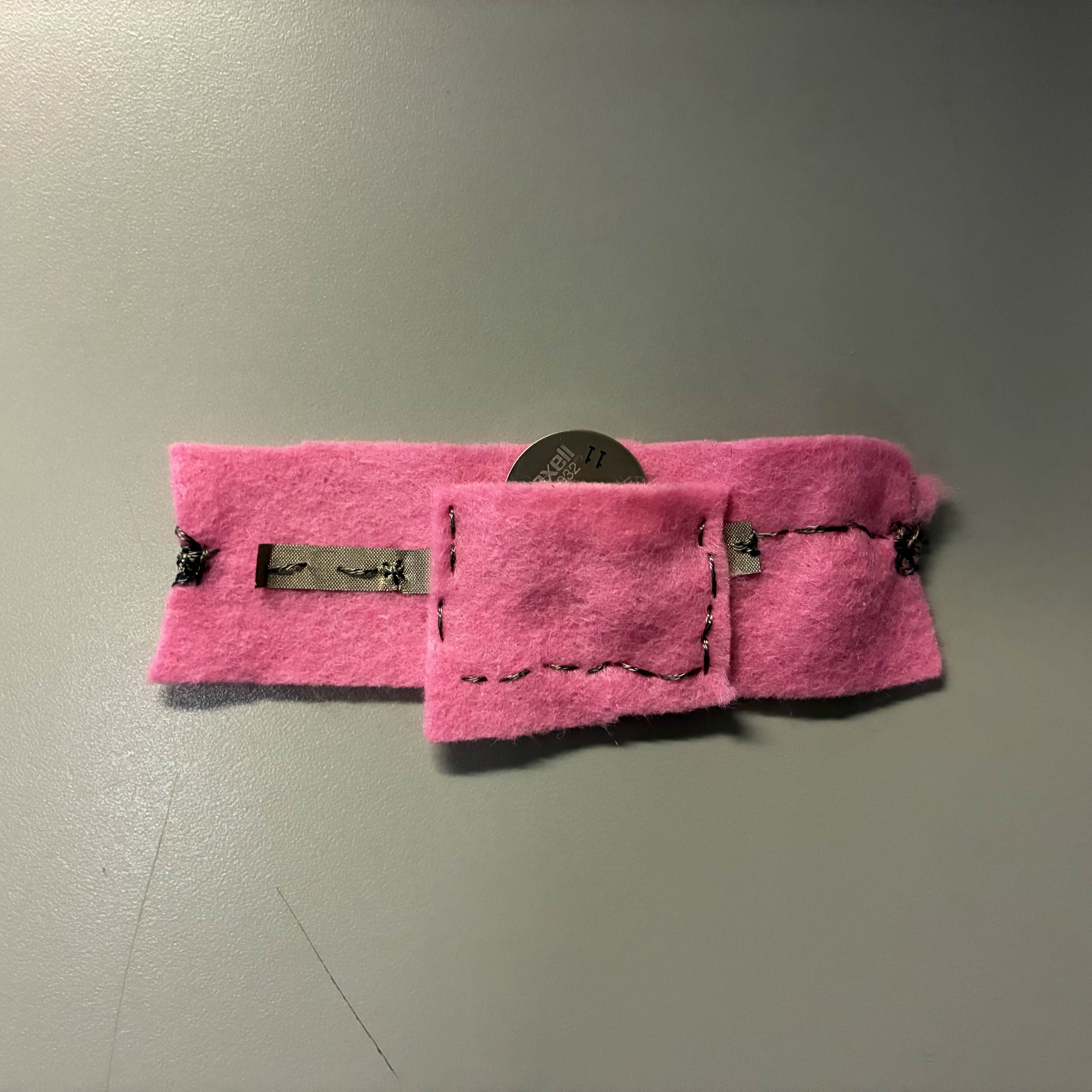 I put the battery inside the pocket to make sure it fit but this is when I realized I forgot to add the LED light which defeated the whole purpose of making this battery holder. I felt really unwise after this one.