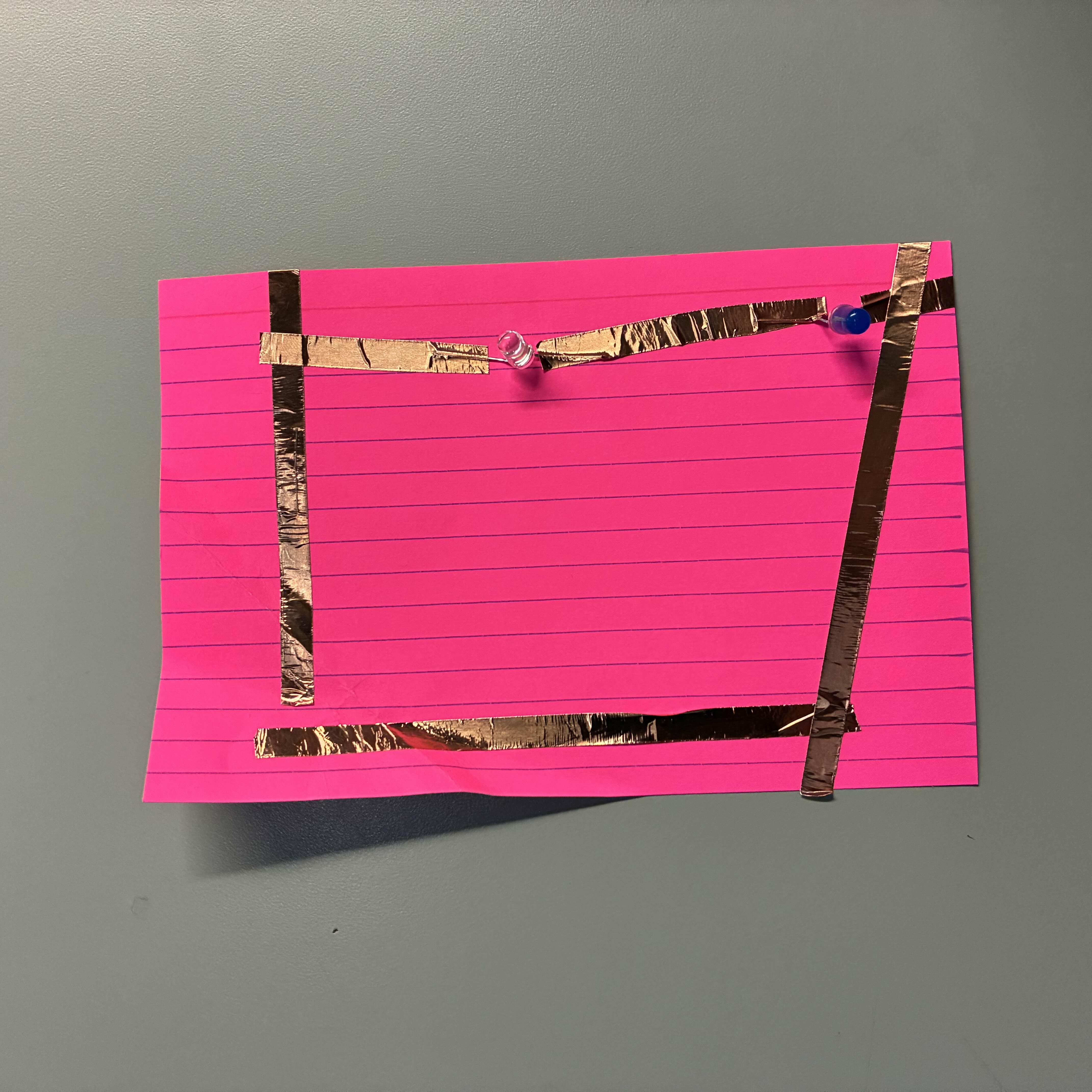 This was my second failed attempt at a series circuit. I thought I didn't do it right because I was only using one battery instead of two. The fold also didn't line up properly and the way the tape was laid out was aesthetically displeasing.