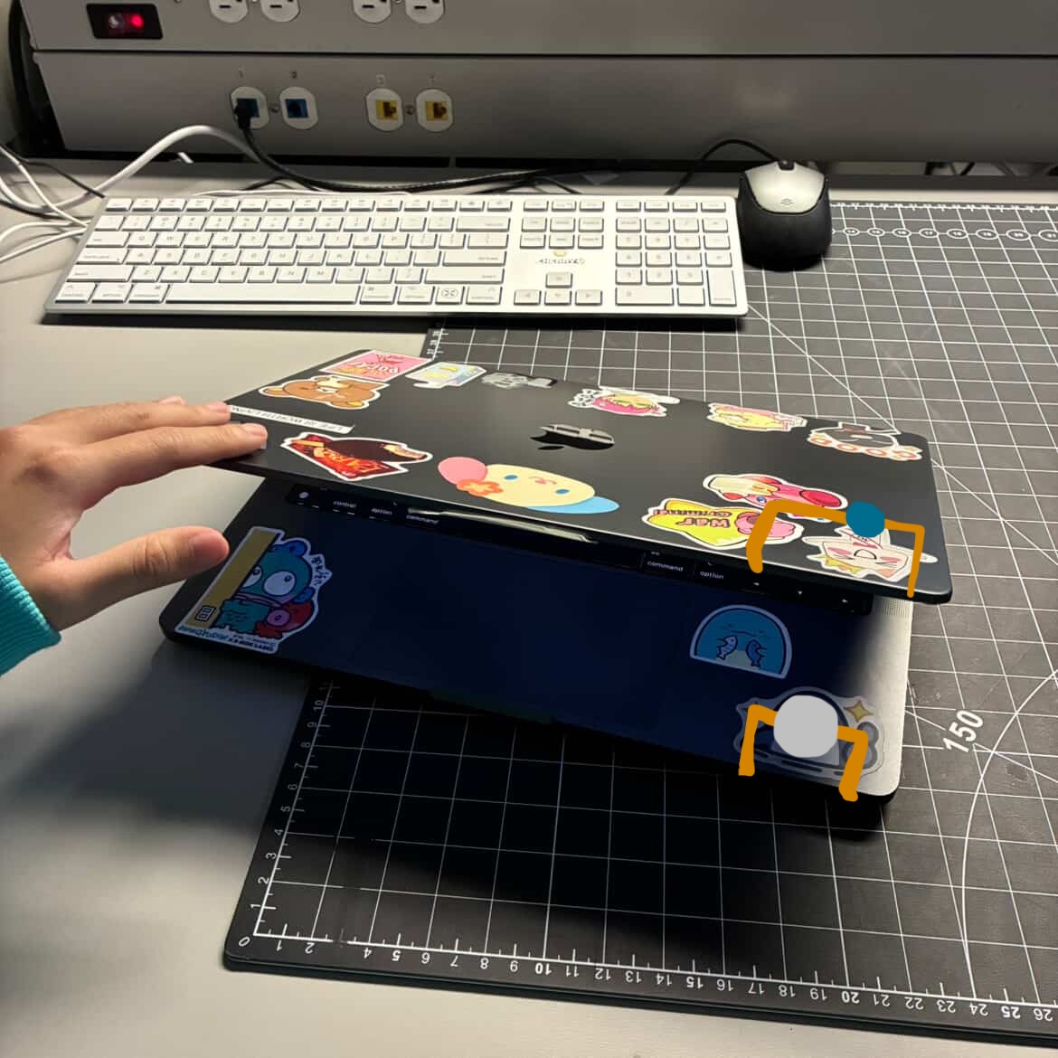 This is my laptop opened. There is copper tape on the bottom part of the laptop with the battery on top of it. The LED light would be taped to the top of the laptop with some of the tape going beneath it so it will touch the battery at the bottom. When the laptop closes the LED light will turn on.