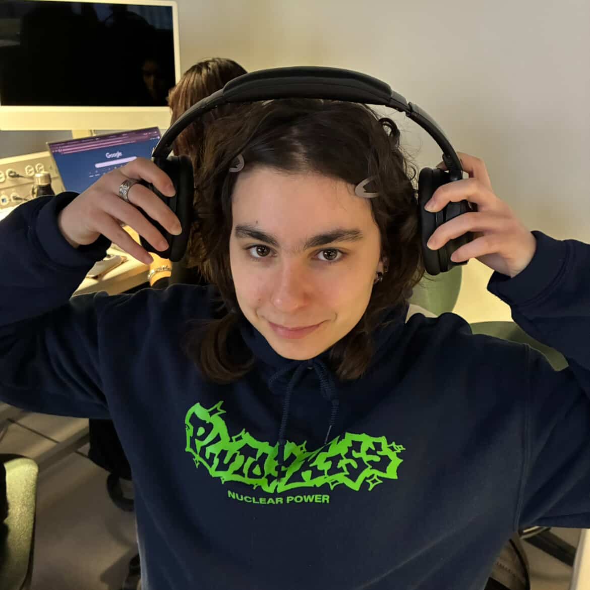 This is Sofia putting on her headphones.