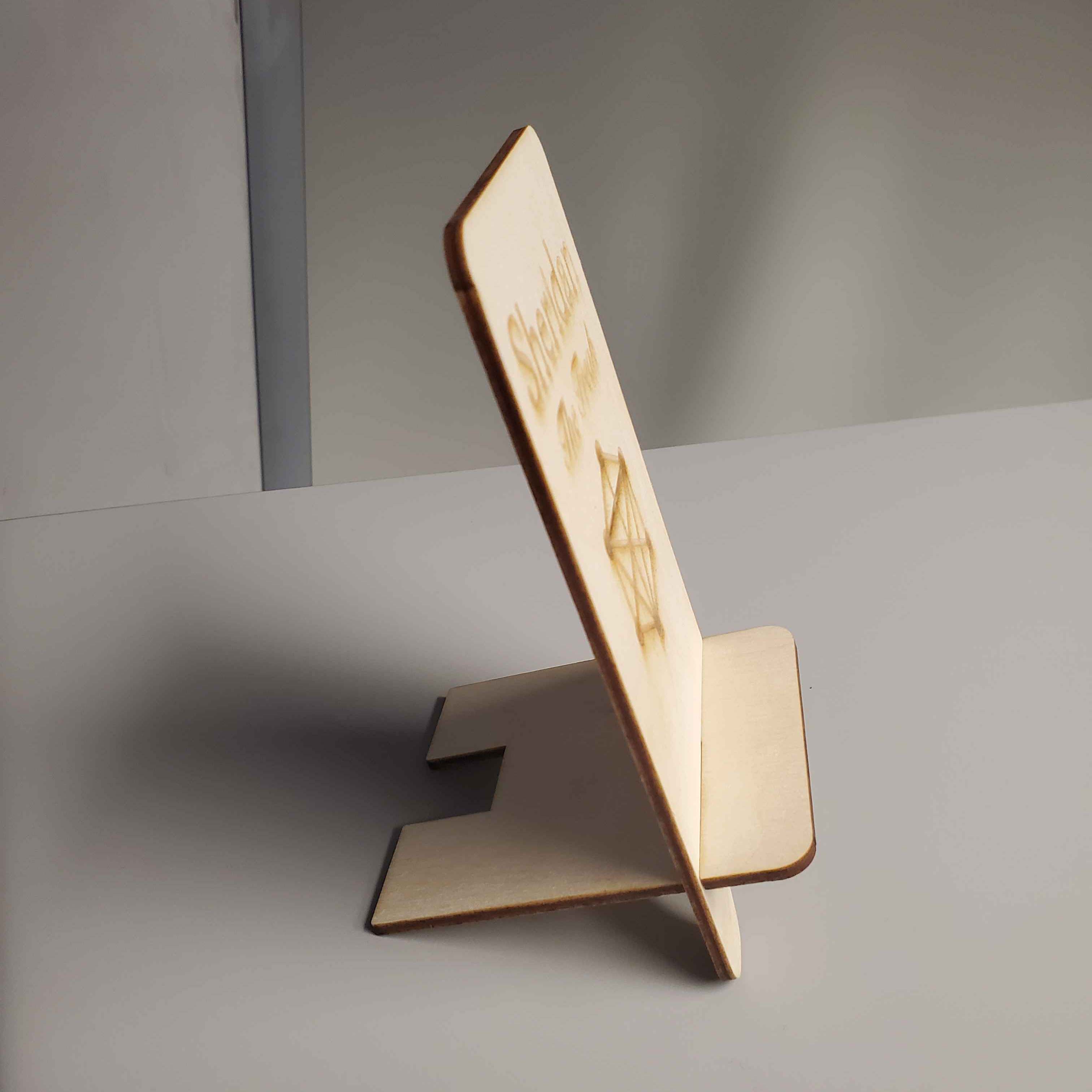 This is the side profile of the phone holder when it is assembled and sanded down