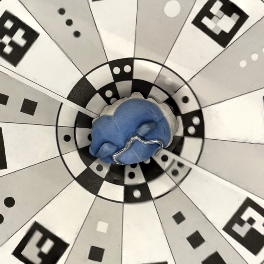 I chose the Hachiware keychain to put into Meshmixer because it had this giant hole at the bottom. It almost looks like an optical illusion but there's a huge hole underneath that will show the top of the model through the hole.